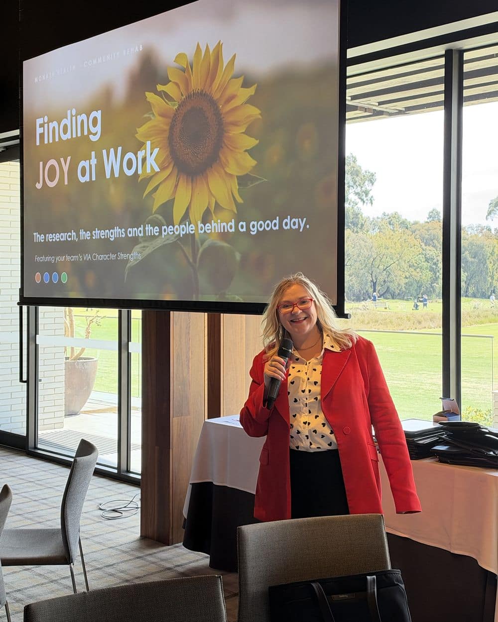 Jane Wundersitz presenting Finding Joy at Work to a health team