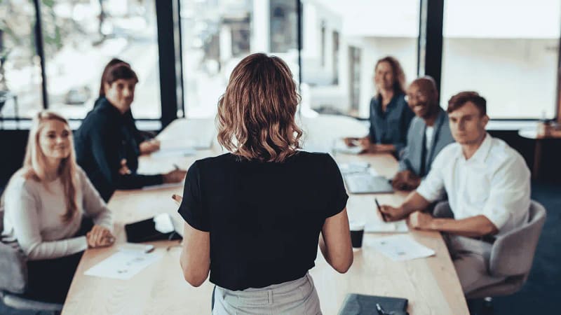 Leader empowering an employee through trust, autonomy, and accountability in the workplace.